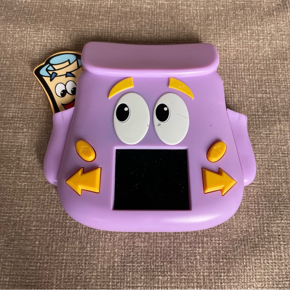 2010 technosource Dora the explorer Dora’s backpack adventure handheld LCD game